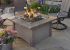 Outdoor GreatRoom Company Log Set and Lava Rock in use with the Pine Ridge 2424 Fire Pit Table